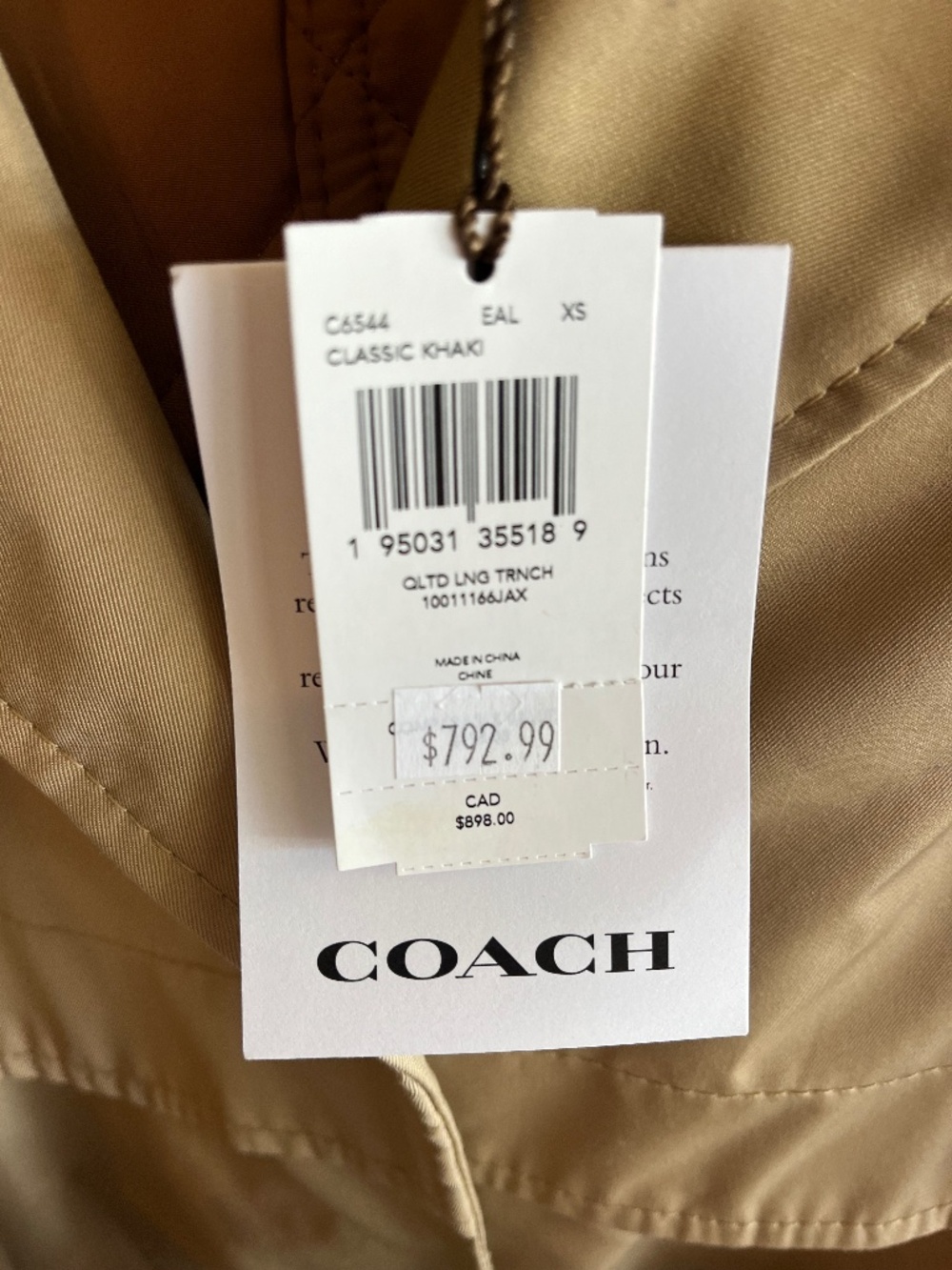 Coach trench coat. New with tag and bag.